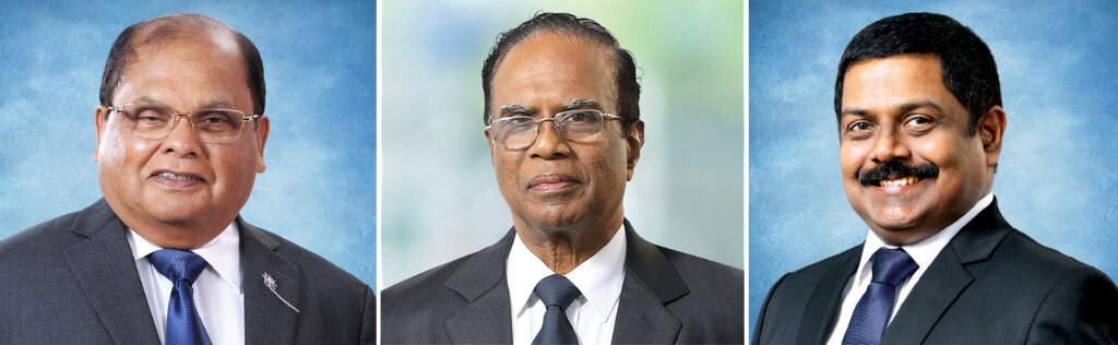 Commercial-Bank’s-former-Chairman-Mr-Dharma-Dheerasinghe-present-Chairman-Justice-K.-Sripavan-and-MD-Mr-S.jpg