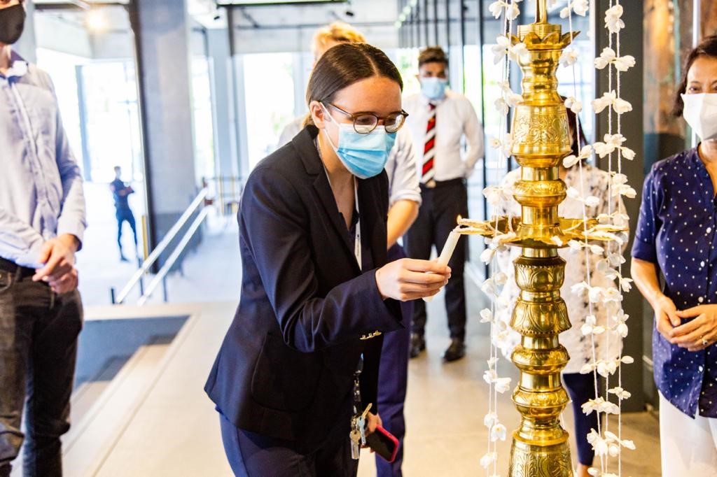 Ms-Hilde-Berg-Hansen-Chargé-d’affaires-a.i.-lighting-the-traditional-oil-lamp-at-the-new-premises.-credit-Milan-Joiey-Smahon.jpg
