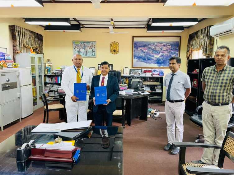 Mr. Gahanath Pandithage, Group CEO of DIMO and Senior Professor Sujeewa Amarasena, Vice Chancellor of University of Ruhuna exchanging the agreements (LBN Fill)