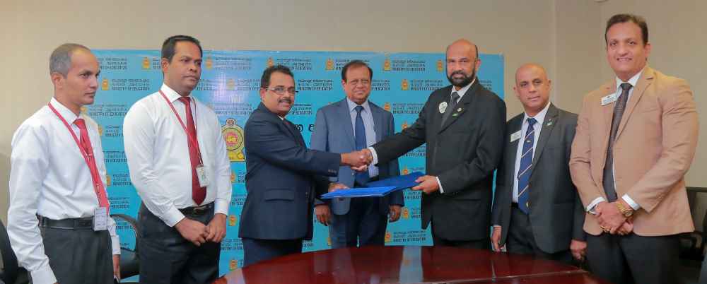 Representatives-of-Lions-Clubs-International-at-the-MoU-signing-held-at-the-Ministry-of-Education-LBN.jpg