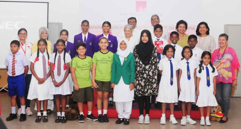 Schoolchidren attending the launch of the LAF Children's Book on Dementia together with LAF Directors (LBN)