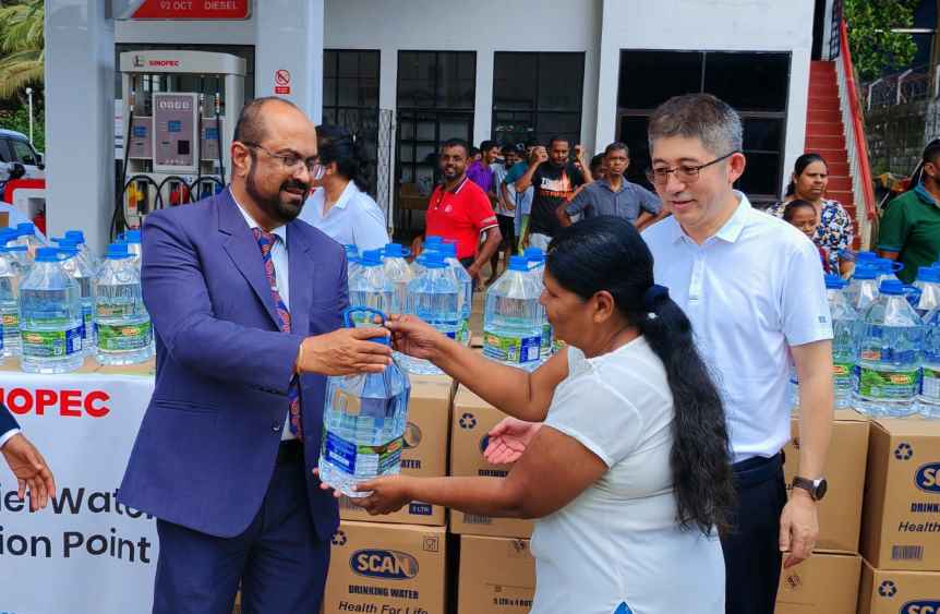Sinopec-Clear-Spring-Flood-Relief-Water-Donation-Media-Release-FINAL-v6-SI-V2-3-LBN.jpg