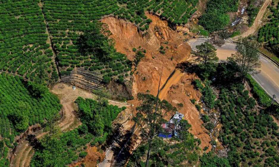 Photo caption and courtesy -An aerial view of a washed-out road following a landslide in Nuwara Eliya- a village in Sri Lanka—AFP (LBN)